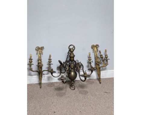 A pair of antique gilt metal three-branch wall Lights / Sconces, with ribbon pediments, note one with damage to central branc