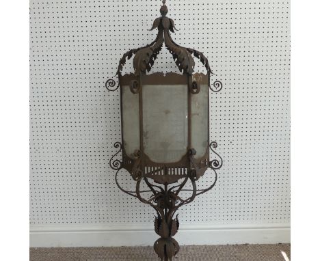 A large 19th century French style wrought Iron Lantern / street Light, pediment with decorative scrolling above five glass pa
