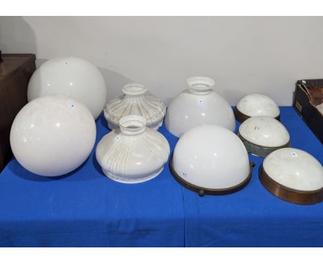A large opaque glass round Globe / Shade, W 35 cm x H 35 cm, together with another of a smaller size, three opaque glass dome
