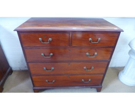 A 19th century mahogany chest of two short over three long graduated drawers raised on bracket supports