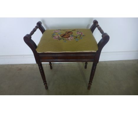 An Edwardian piano stool
