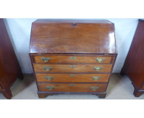 A 19th century mahogany  bureau, the fall front opening to reveal a series of correspondence drawers and pigeon holes above f