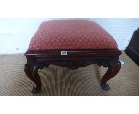 A 19th century mahogany stool on cabriole legs with a recently upholstered top