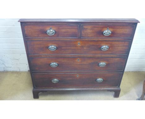 A Georgian mahogany chest with two short over three long drawers on bracket feet with a good patina measuring Width 102cm x H