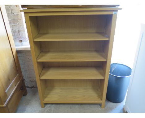 A set of oak open faced bookcase of four tiers raised on bracket supports - Height 134cm x Width 97cm x Depth 33cm - as new