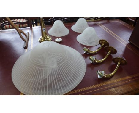 Three modern wall lights and a matching centre light