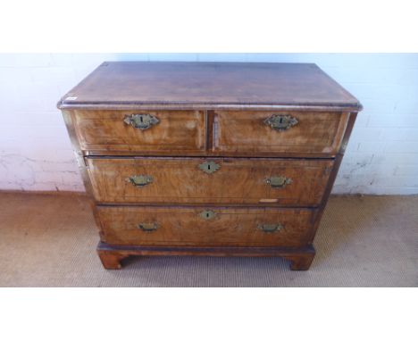 A Georgian walnut four drawer chest on bracket feet - Height 83cm x Width 97cm x Depth 49cm
Provenance: Sherford House, Bromy