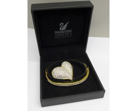A Swarovski bangle and heart brooch, boxed 