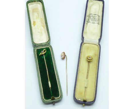 A 15ct gold and sapphire stick pin, cased, a diamond set stick pin, a/f and a cameo stick pin 