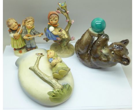 A Goebel circus bear, wall pocket, (a/f) and two figures 