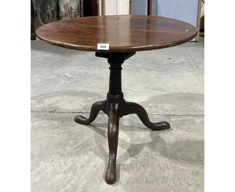 A George III mahogany snap-top tripod table with bird cage action 