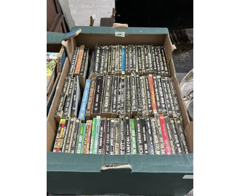 A box of vintage Ace paperbacks