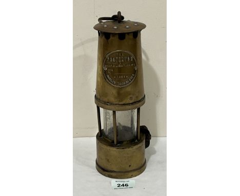 A Protector of Eccles, Manchester brass miner's lamp. 10" high