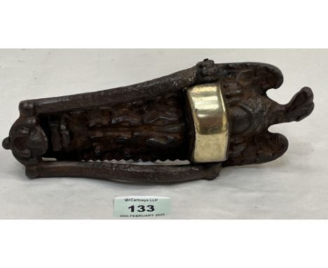 A 19th century cast iron and brass applied eagle door knocker. 8½" high