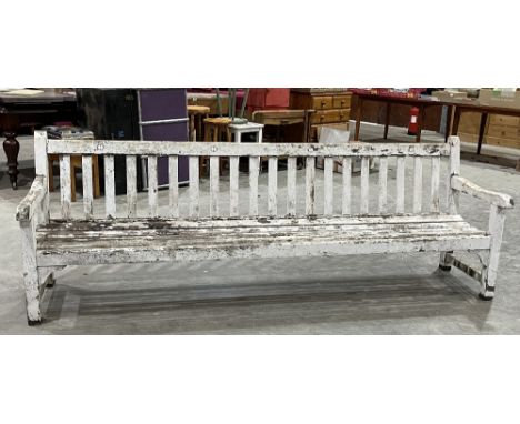An 8' teak slatted cricket ground bench. Provenance: Worcestershire County Cricket Club