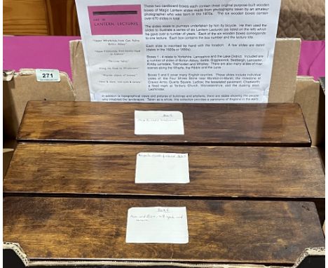 A collection of magic lantern slides in six wood boxes, early 20th century. Over 670 slides in total