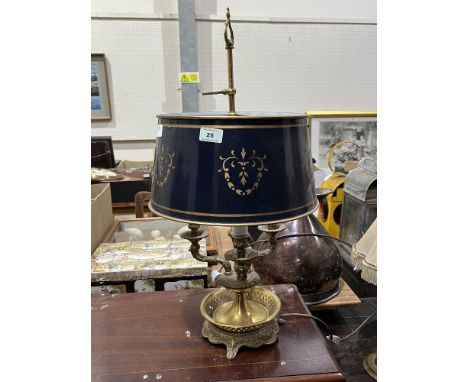 A brass bouillotte table lamp with three leaf moulded arms and telescopic tole shade. Of recent manufacture