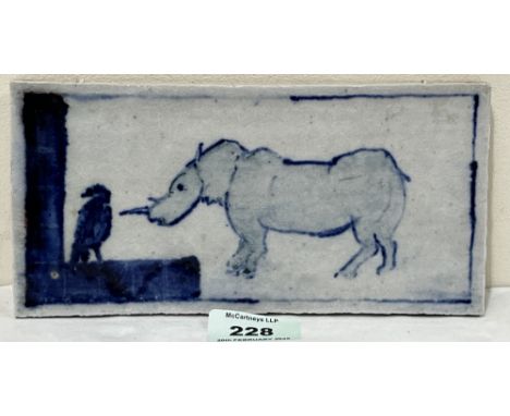 ERIC JAMES MELLON, BRITISH 1925-2014 A studio pottery tile painted in blue and white with a Rhinoceros and bird. Signed and i