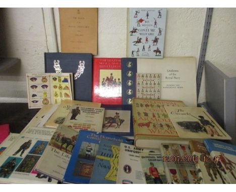 A collection of military related costume books to include a 1965 first edition Uniforms of the Royal Navy by Hugh Evelyn with