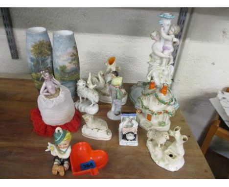 A collection of figural groups to include Staffordshire and Hummel 