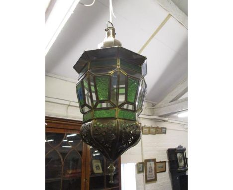A Moroccan metal framed glass lantern 