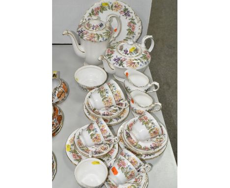 A GROUP OF PARAGON 'COUNTRY LANE' PATTERN COFFEE AND TEAWARE, comprising  a cake plate, coffee pot, tea pot, milk jug, sugar 