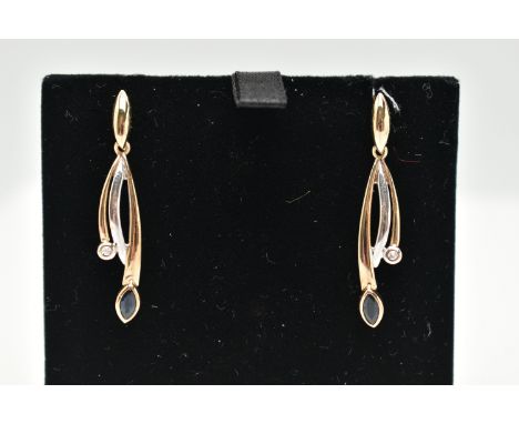 A BOXED PAIR OF 9CT GOLD SAPPHIRE AND DIAMOND EARRINGS, drop earrings each set with a marquise cut blue sapphire and a single