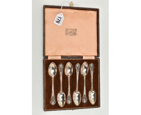 A CASED SET OF SIX SILVER TEASPOONS, floral pattern with open work terminals, each hallmarked 'Joseph Rodgers &amp; Sons' She