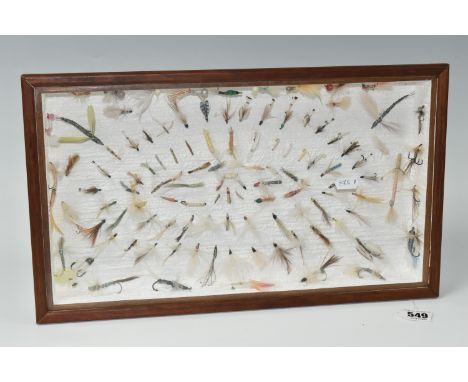 A DISPLAY BOX OF VINTAGE SALMON AND TROUT FLIES, a quantity of flies are mounted into a glass topped display box, approximate