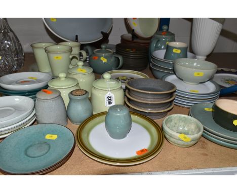 A QUANTITY OF DENBY AND DENBY STYLE TABLEWARES, to include Denby Juice Fruits plates, four 40cm oval platters, three pale gre