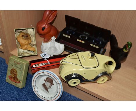 A GROUP OF NAMED CERAMICS AND COLLECTABLES, comprising a Sadler novelty  yellow racing car teapot Reg. No. 820236 (hairline c