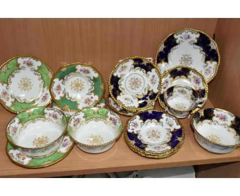 A GROUP OF COALPORT 'BATWING' TEA WARE, comprising  in navy blue batwing pattern: a teacup (sounds dull when tapped), six ass