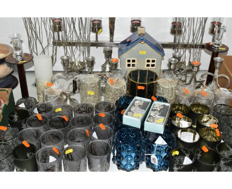A COLLECTION OF CANDLE HOLDERS AND CANDLES ETC, to include a modernist style candelabra holding six tealights, approximate wi