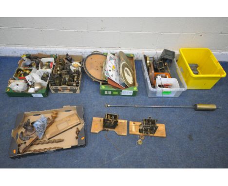 SIX TRAYS CONTAINING WATCHMAKERS TOOLS AND CLOCK PARTS, to include movements, weights, faces, pediments, chimes, etc (6)