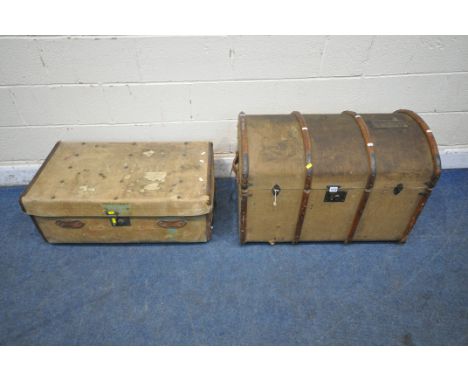 AN ATLAS DOMED CANVAS TRAVELING TRUNK, with wooden banding and twin leather handles, width 82cm x depth 52cm x height 57cm, a
