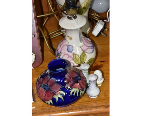 A GROUP OF MOORCROFT TABLE LAMPS AND VASE, comprising a 'Magnolia' design table lamp, pale pink and purple magnolia on a crea