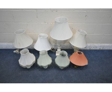 A VARIETY OF TABLE LAMPS, to include a large alabaster table lamp, six other marble/alabaster table lamps and a brass lamp (c