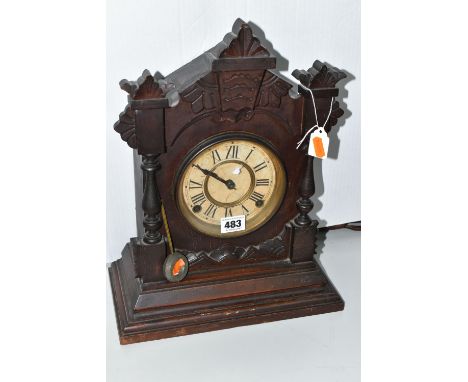 A AMERICAN MANTEL CLOCK, made by The Ansonia Clock Company - New York, a stained pine, striking gong movement, with pendulum,