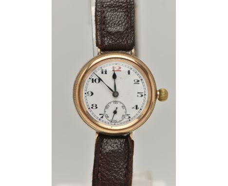 A GENTS 9CT GOLD, EARLY 20TH CENTURY TRENCH WATCH, manual wind, round white dial, Arabic numerals, subsidiary seconds dial at