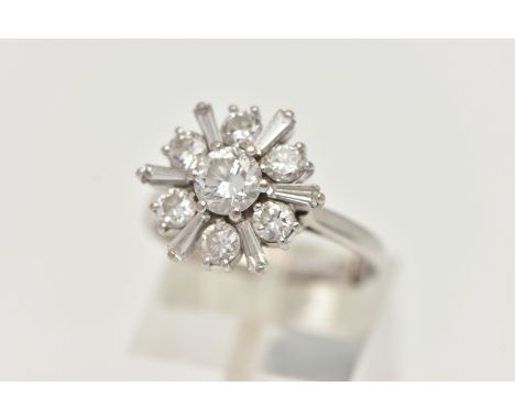 AN 18CT WHITE GOLD DIAMOND CLUSTER RING, centering on a round brilliant cut diamond, estimated diamond weight 0.50ct, measuri