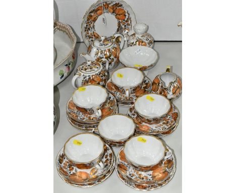 A LOMONOSOV IMPERIAL RUSSIAN PORCELAIN TULIP 'MY GARDEN' PATTERN TEA SET, comprising a small tea pot (possibly mismatched lid