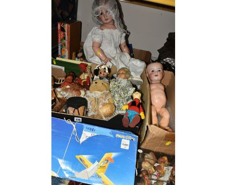 THREE BOXES OF VINTAGE TOYS, DOLLS AND GAMES, to include a porcelain doll with composite body, arms and legs, impressed mark 