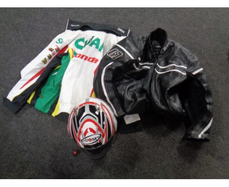 A Suomy motorcycle helmet together with a Honda licence product jacket bearing advertising and an RK sport leather motorcycle