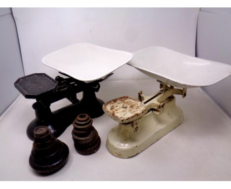 Two sets of antique enamelled kitchen scales and weights 