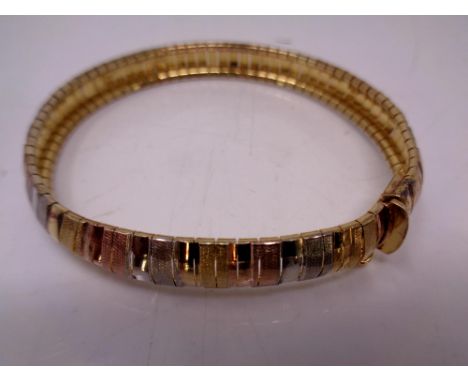 A silver multi coloured bangle 