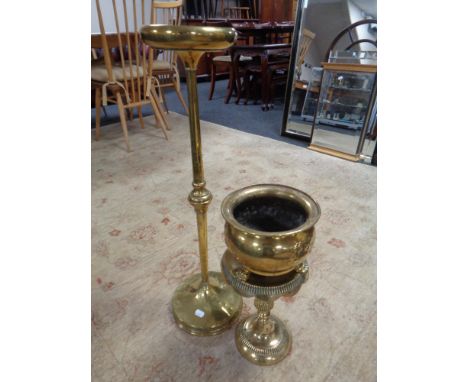 A 19th century brass plant stand together with brass trivet and planter on paw feet 