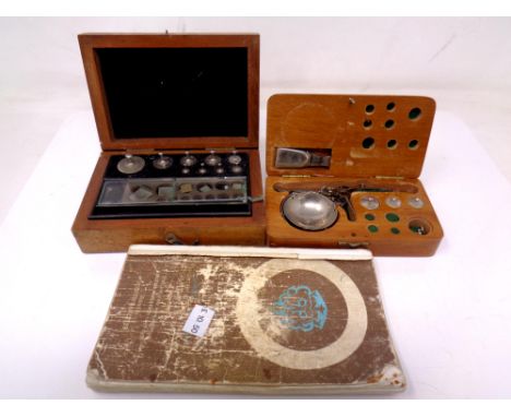 A hallmark book, together with a set of miniature scales and weights in cases 