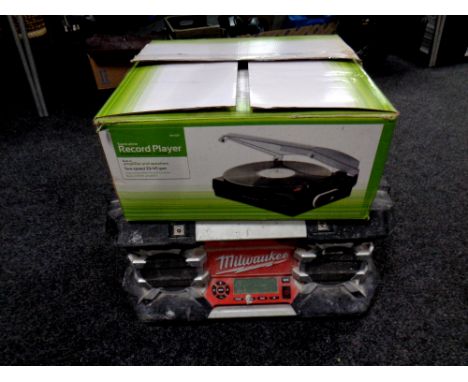 A Milwaukee radio together with a stand alone record player in box 