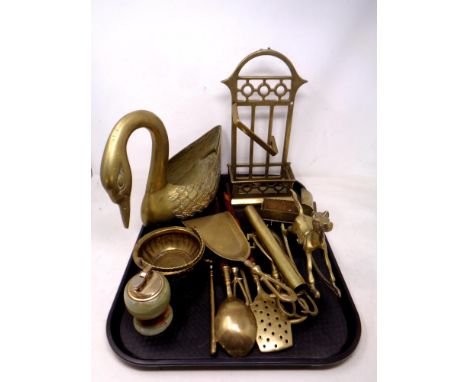 A tray of brass wares, swan planter, onyx and brass lighter, rocking horse, companion stand etc 