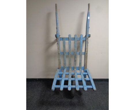 A vintage wooden porter's barrow 